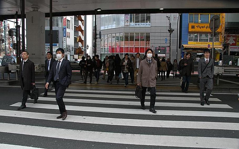Crowds were thinner than usual in Tokyo?s Roppongi district this week.