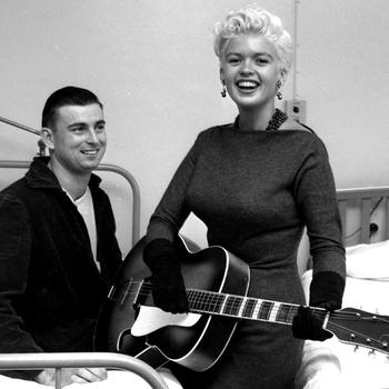 Jayne Mansfield visits with one of the patients at the Army’s 97th General Hospital in Frankfurt, Germany Oct. 5, 1957. The photographer identified the patient as Greiner (last name only).