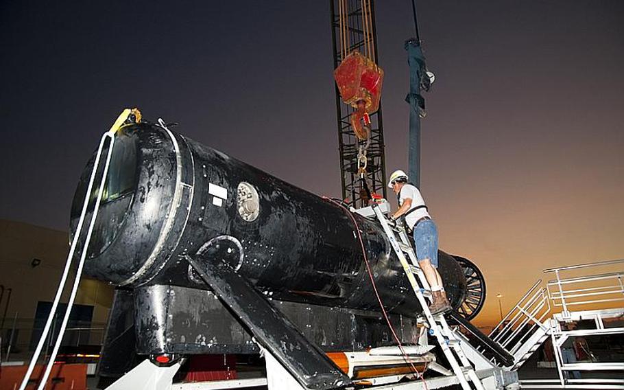 Engineers from Naval Surface Warfare Center Panama City recover the Remote Multi-Mission Vehicle, part of the littoral combat ship mine countermeasures mission package, after at-sea tests. The mine countermeasures mission package provides LCS platforms the capability to detect, identify and neutralize sea mines. 