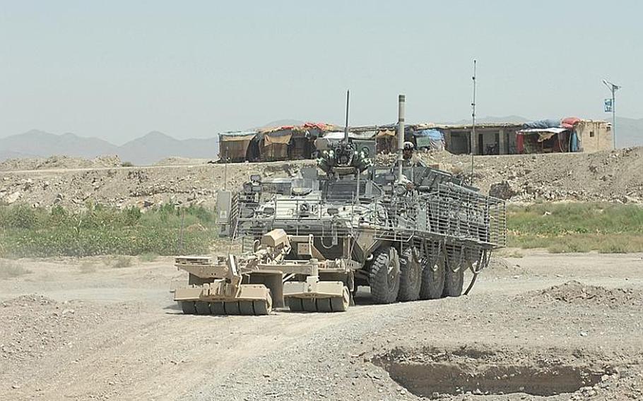 A 2nd Stryker Cavlary Regiment Stryker armored personnel carrier on the road in Kanadahar Province, Afghanistan last summer.