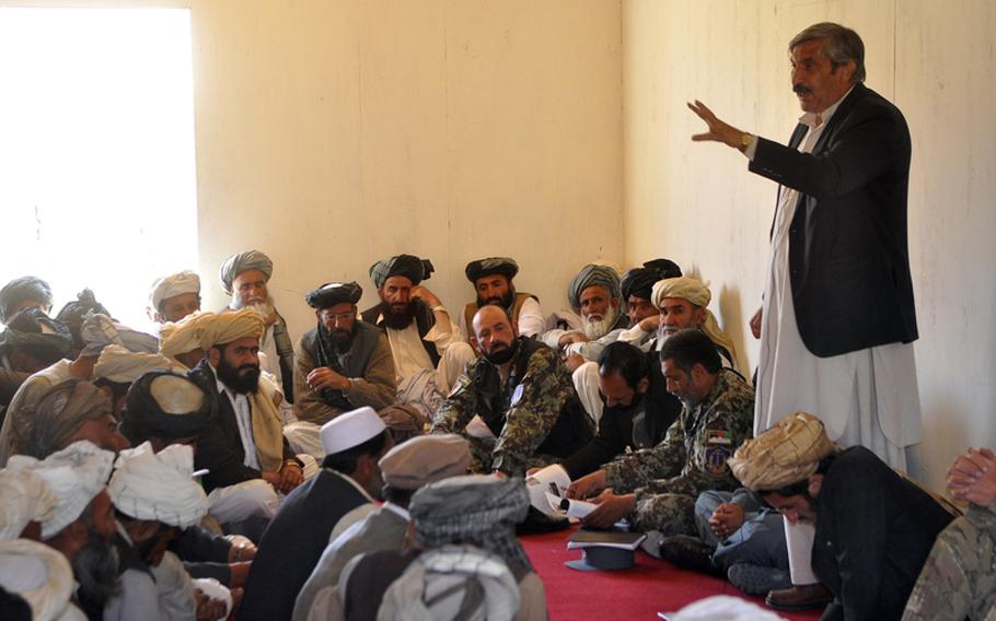 Atiqullah Lodin, governor of Logar Province, addresses tribal elders from the province&#39;s southern villages during a shura held last week in the Kharwar district.