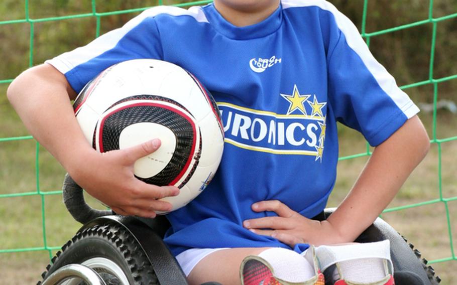 Dustin Stallberg, 8, in his sports wheelchair. Born with spina bifida, Dustin, wants to follow in the treads of his hero, Aaron "Wheelz" Fotheringham, a wheelchair athlete. Dustin, the son of Army Sgt. Timothy Stallberg of the 172nd Infantry Brigade in Schweinfurt, will get to meet Fotheringham later this summer in Las Vegas, after winning a local radio station's contest in Germany.