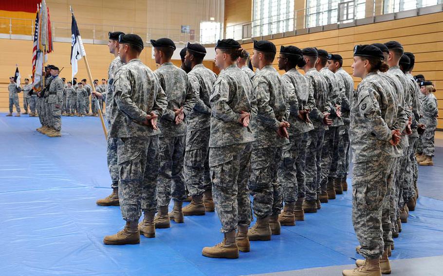 Soldiers of V Corps attend a ceremony Friday marking the move of the corps from Heidelberg, Germany, to Wiesbaden. A scheduled inactivation in 2009 was postponed, then canceled, as V Corps remains the only permanently forward deployed corps in the Army.