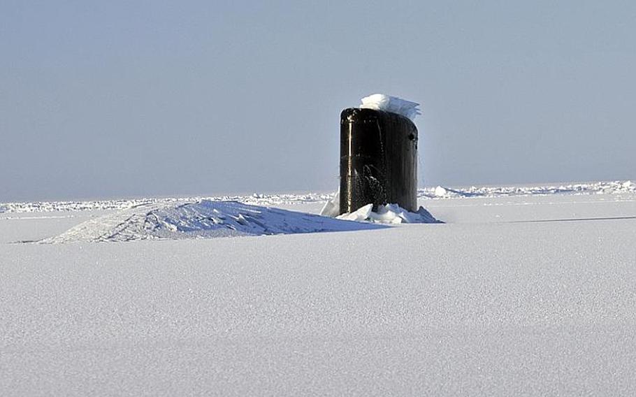 The Los Angeles-class submarine USS Annapolis (SSN 760) breaks through three feet of ice while participating in Ice Exercise (ICEX 2009) in the Arctic Ocean.