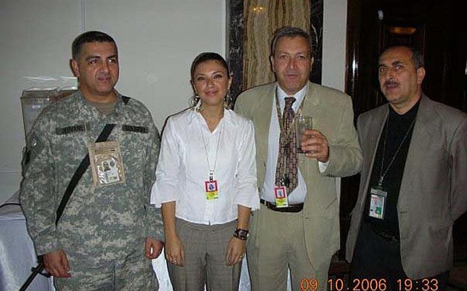 In this photo, taken about a month prior to his abduction at a VIP function in Baghdad, Staff Sgt. Ahmed Altaie, far left, poses for photos with VIPs. Altaie, shown here with the name ''Jeovane'' on his uniform for security purposes, is the last servicemember to be held as a prisoner of war in Iraq. He was abducted on Oct. 23, 2006 after sneaking outside the Green Zone to visit his Iraqi wife.