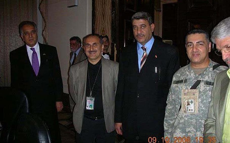 In this photo, taken about a month prior to his abduction at a VIP function in Baghdad, Staff Sgt. Ahmed Altaie, second from right, poses for a photo with VIPs including U.S. ambassador to Iraq Zalmay Khalilzad, far left, who would later go on to serve as U.S. ambassador to the United Nations. Friends and family say that Altaie, shown here with the name ''Jeovane'' on his uniform for security purposes, worked as a translator for Khalilzad. Altaie is the last servicemember to be held as a prisoner of war in Iraq. He was abducted on Oct. 23, 2006 after sneaking outside the Green Zone to visit his Iraqi wife.