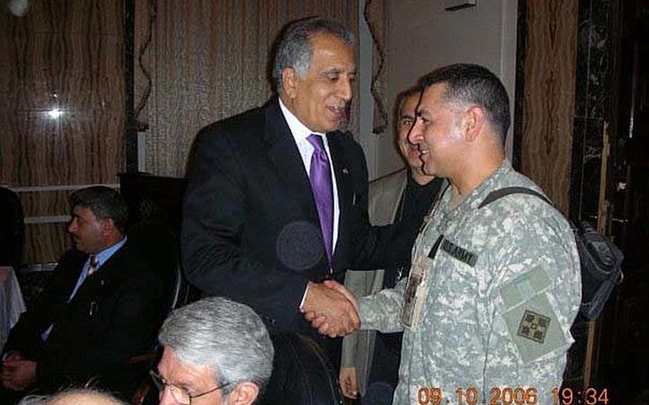 In this photo, taken about a month prior to his abduction at a VIP function in Baghdad, Staff Sgt. Ahmed Altaie, right, shakes hands with U.S. ambassador to Iraq Zalmay Khalilzad, who would later go on to serve as U.S. ambassador to the United Nations. Friends and family say that Altaie, shown here with the name "Jeovane" on his uniform for security purposes, worked as a translator for Khalilzad. Altaie is the last servicemember to be held as a prisoner of war in Iraq. He was abducted on Oct. 23, 2006 after sneaking outside the Green Zone to visit his Iraqi wife.