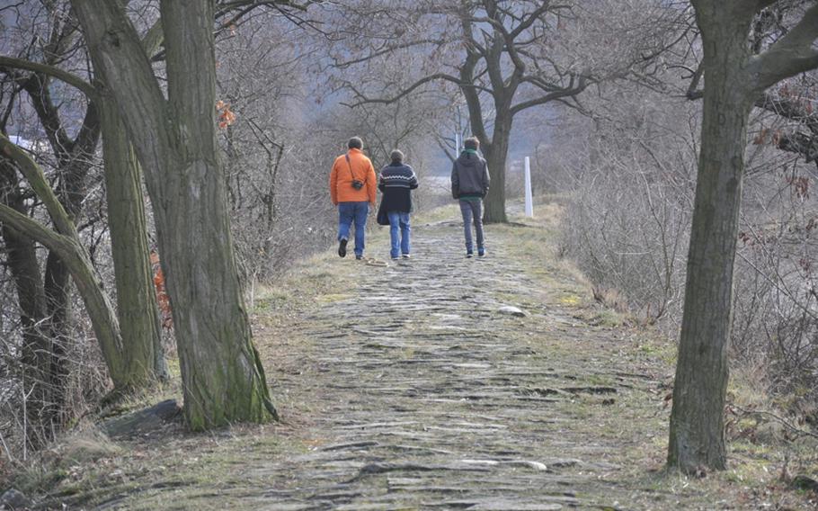 A trio of visitors to the "Lorelei" statue walks the rugged footpath that leads to the statue. Good, sturdy shoes are in order for this walk, and it's not recommended for children because of the jagged stones that make up the path.