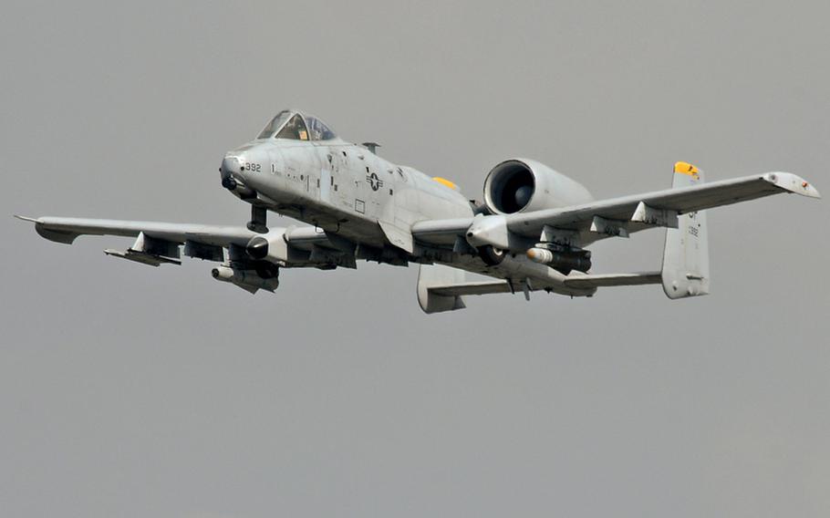 An A-10 "Warthog" flies over the Spangdahlem Air Base, Germany, runway. Pilot error is to blame for the crash of an A-10C Thunderbolt II near Spangdahlem on April 1, 2011, according to the findings of an Air Force crash investigation board.