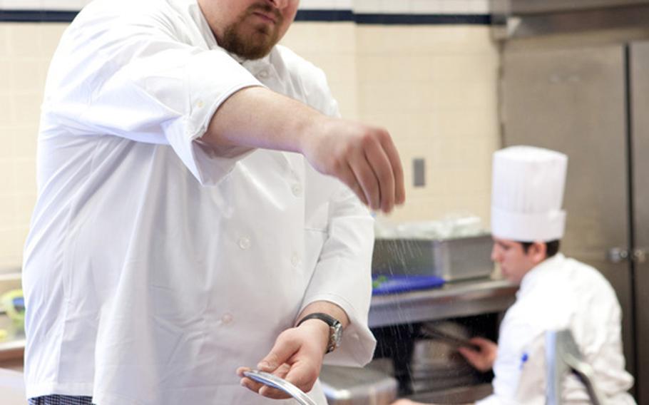 Former Army Ranger Sgt. Jeremy Feldbusch, who was blinded by an artillery shell in Iraq, fries up some chicken strips at the Culinary Institute of America’s Healthy Cooking Boot Camp last week in New York.