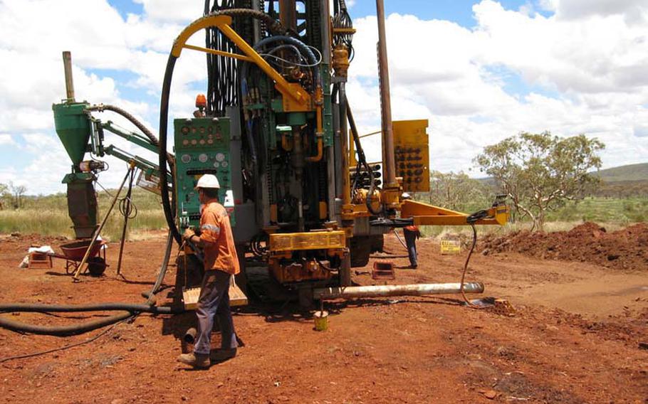 With a booming mining industry, Australian companies are recruiting U.S. veterans with heavy machine experience to work in places like the BHP Billiton minesite in western Australia.
