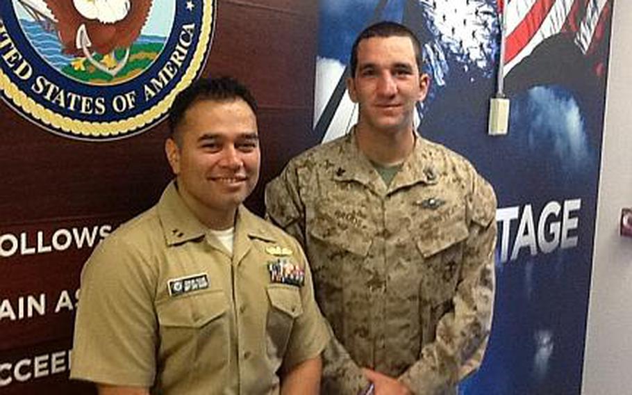 Navy corpsman Redmond Ramos, right,with Lt. Edward Valdez of the Navy Safe Harbor program. Navy Safe Harbor pairs Navy and Coast Guard sailors, whose conditions range from combat wounds to neurological disorders, with case managers for a lifetime of assistance in recovery, rehabilitation and reintegration.
