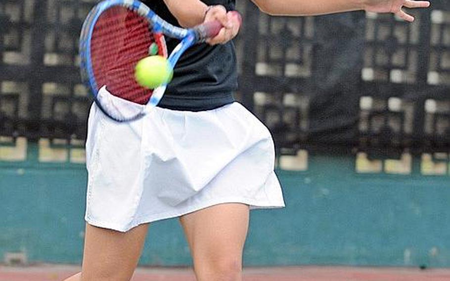 Yokota Panthers&#39; Emily Beemsterboer smacks a forehand against Kadena Panthers&#39; Kristin Howard during Tuesday&#39;s girls quarterfinal singles match in the Far East High School Tennis Tournament at Risner Tennis Complex, Kadena Air Base, Okinawa. Beemsterboer won 8-3.