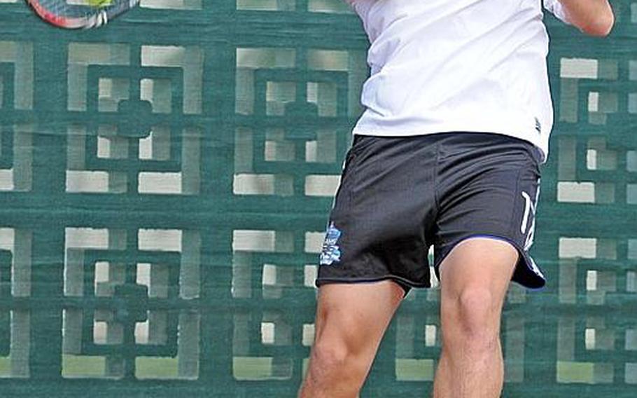 Andrew Clark of Seoul American Falcons unleashes a forehand against K.J. Reyes of Zama American Trojans during Tuesday&#39;s boys second-round singles match in the Far East High School Tennis Tournament at Risner Tennis Complex, Kadena Air Base, Okinawa. Clark won 8-0, then beat Jun Lee of Yongsan International-Seoul in the quarterfinal 8-1.