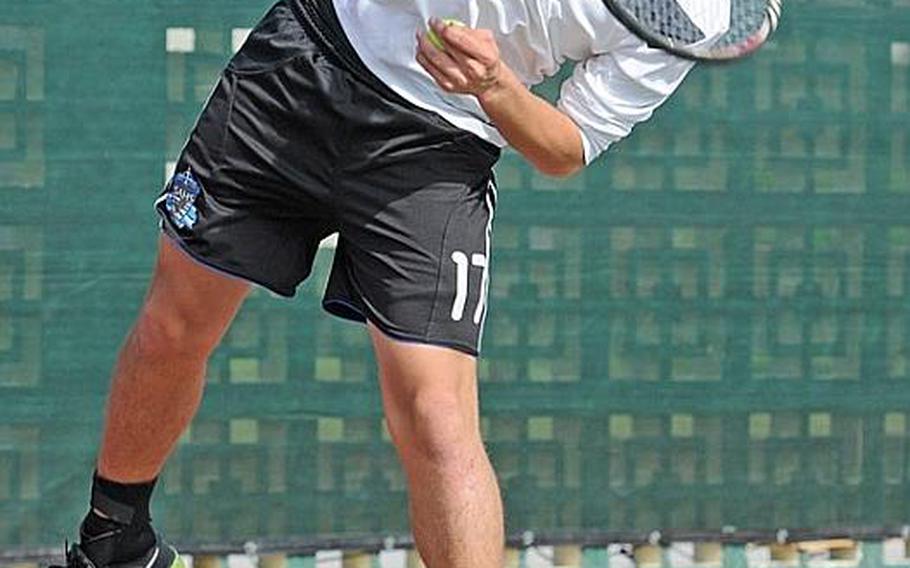 Andrew Clark of Seoul American Falcons serves against K.J. Reyes of Zama American Trojans during Tuesday&#39;s boys second-round singles match in the Far East High School Tennis Tournament at Risner Tennis Complex, Kadena Air Base, Okinawa. Clark won 8-0, then beat Jun Lee of Yongsan International-Seoul in the quarterfinal 8-1.