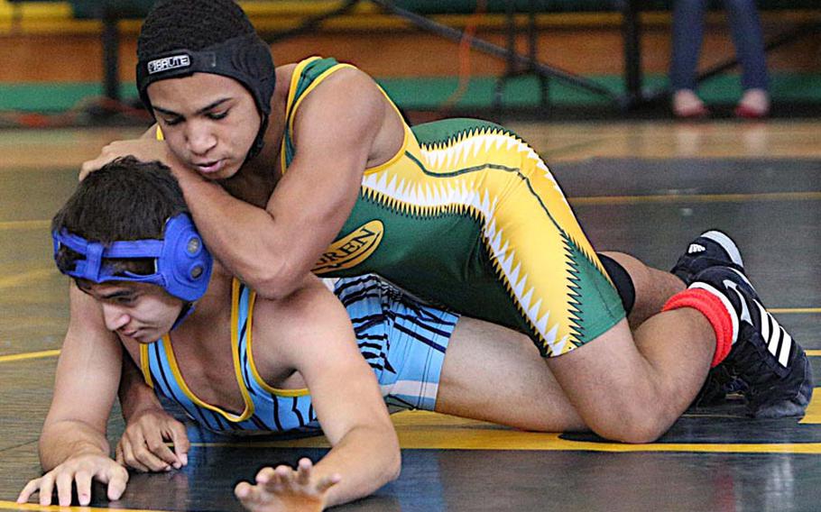 Robert D. Edgren's Kaleb Atchison takes control against Stephen Borin of Yokota during a 141-pound bout in Saturday's Robert D. Edgren Invitational Wrestling Tournament at Misawa Air Base, Japan. Atchison took the weight-class bronze medal.