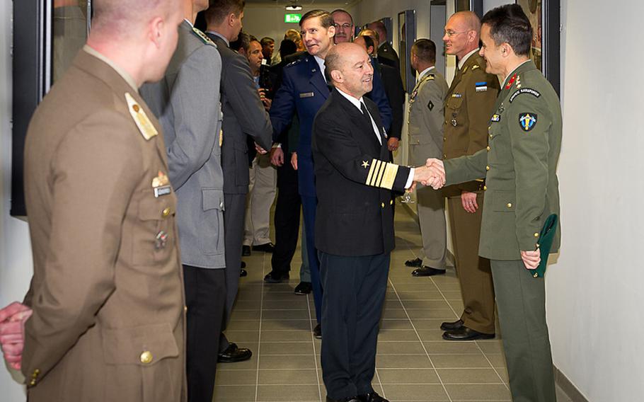 Supreme Allied Commander Europe Admiral James Stavridis meets NATO Special Operations Headquarters personnel after official opening of the new headquarters building in Mons, Belgium, Dec. 12, 2012.