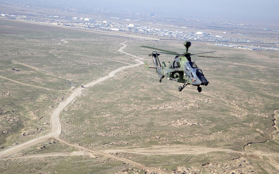 A Tiger attack helicopter flies a test mission Thursday near Mazar-e Sharif, in northern Afghanistan. The German army recently sent four Tigers to Afghanistan, representing the country's first deployment of attack helicopters in combat.