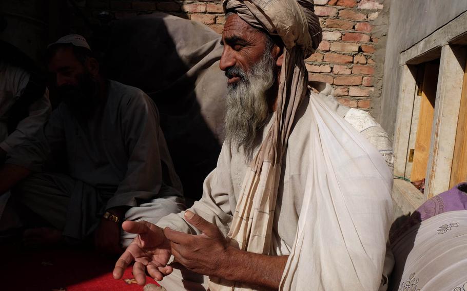 Mohammed Dawoud, a resident of Helmand province, Afghanistan, describes the firefight on his farm during which he was shot three times. He says if Afghan forces can roll back the Taliban insurgents, then there will be peace. He is shown here on Tuesday, Sept. 23, 2014.