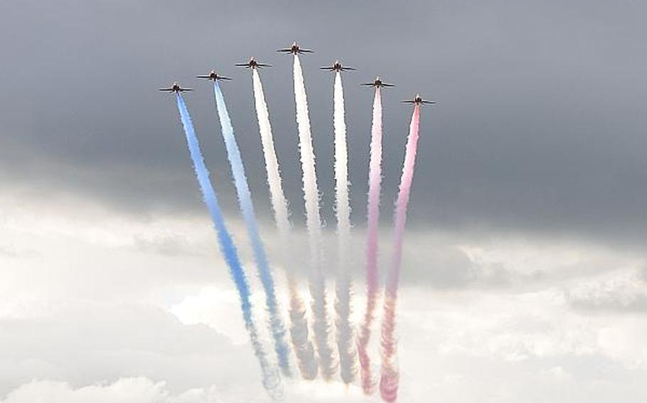 The Royal Air Force Red Arrows Aerobatic Team performs during the Independence Day celebration at RAF Feltwell on July 4, 2012. The celebration was canceled this year due to budget constraints. Connor Estes/Courtesy U.S. Air Force