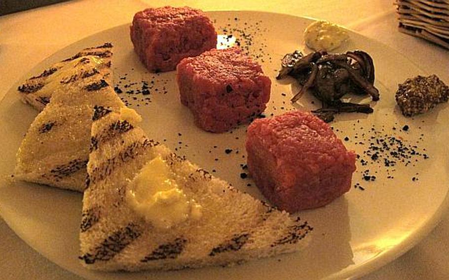 Chianina is a lean meat, with no fat. At Antifco Guelfo, in Vicenza, Italy, it is served raw with caramelized onions and two sauces: a tartar sauce that accentuates the pureness of the meat and a mustard sauce that brings out the exceptional quality of the meat.