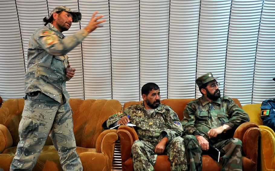 An Afghan Border Police representative at a security Shura in April angrily denounces the decision to tear down a border checkpoint that was run by Afghan contractors working for the Americans. As the U.S. contract ended, the checkpoint was demolished to keep it from falling into the hands of insurgents. The Afghan National Security Forces were having trouble finding soldiers to take over bases from Americans as the International Security Assistance Force shrinks its presence.