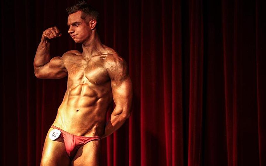 Army Sgt. Casey Call from Stuttgart performs his single routine Saturday in the 2013 Bodybuilding and Figure Invitational in Kaiserslautern.