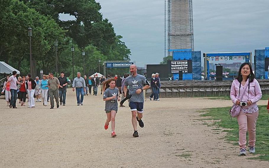About 120 veterans and their families took part in the "Run as One" event in Washington, D.C., 
                on May 18.