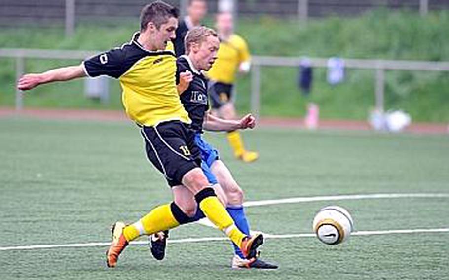 Alconbury's Jeffrey Black, left, gets past Incirlik for a shot on goal in the Dragons' 3-2 win over the Hodjas in a Division III match on Tuesday.