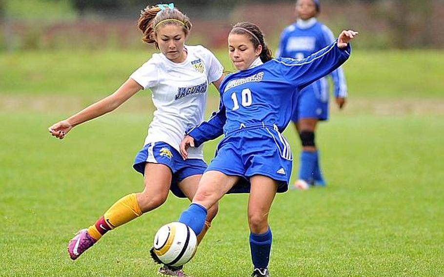 64 p rb
                Sigonella's Michelle Creollo, left, and Rota's Alejandra Codero-Ramosight for a ball in the Admirals' 1-0 win over the Jaguars in a Division III game Tuesday.