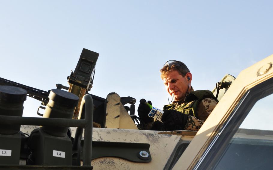 Staff Sgt. Marko L. just before his unit exits the gates at FOB Marmal in Mazar-e-Sharif for a force protection patrol surrounding the FOB.