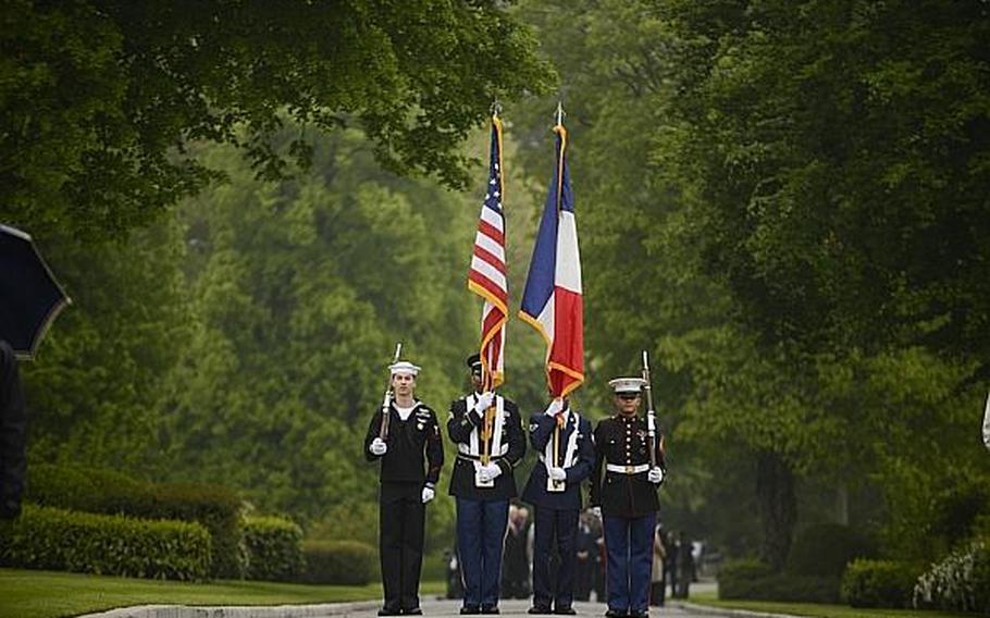 A Color Guard comprised of all four U.S. services prepares to present the colors Sunday morning during an American Memorial Day ceremony at the Meuse-Argonne American Cemetery and Memorial in France. Joshua L. DeMotts/Stars and Stripes