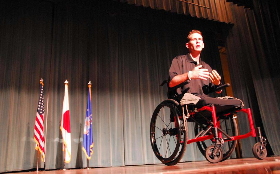 Bryan Anderson, an Iraq war veteran and triple amputee, speaks June 18 at the Keystone Theater at Kadena Air Base on Okinawa. Anderson, who won a regional Emmy for his PBS series, also appeared in ''The Wrestler,'' with Mickey Rourke.