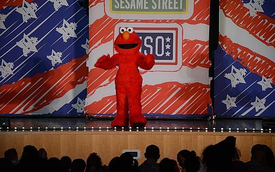 Elmo greets an audience full of children, parents and servicemembers during a "Sesame Street" show at Aviano Air Base, Italy, on Friday, July 5, 2013. "Sesame Street," in conjunction with the United Service Organizations, is traveling across the Pacific and Europe during the summer.
Jason Duhr/Stars and Stripes
