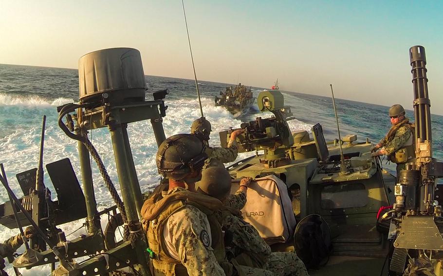 Two Command Riverine Boats from Coastal Riverine Squadron Four, transit to a safe location in the Persian Gulf for a weapons exercise Oct. 20, 2013.