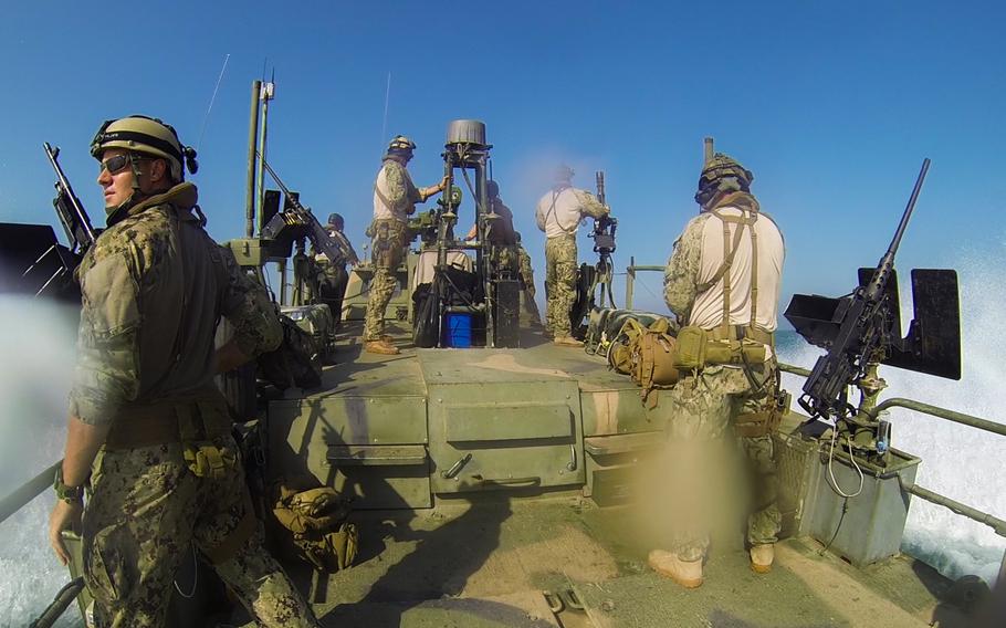 The crew of a Command Riverine Boat from Coastal Riverine Squadron Four, make their way to a safe location in the Persian Gulf for a weapons exercise Oct. 20, 2013.