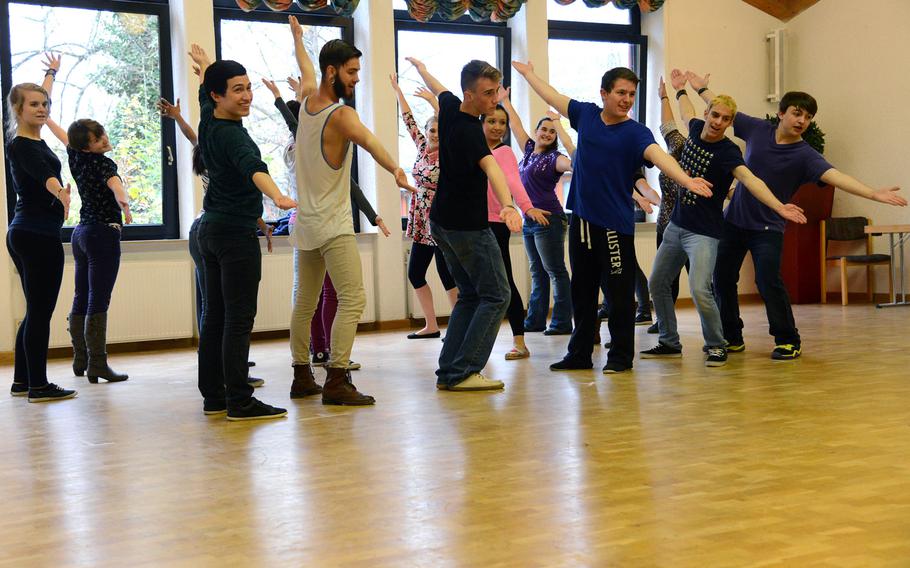 The show choir at this year's Creative Connections rehearse a Browdway tune during a session at the week long program. More than 160 students from DODDS-Europe high schools participated in this year's event that features 11 workshops in the visual and performing arts.