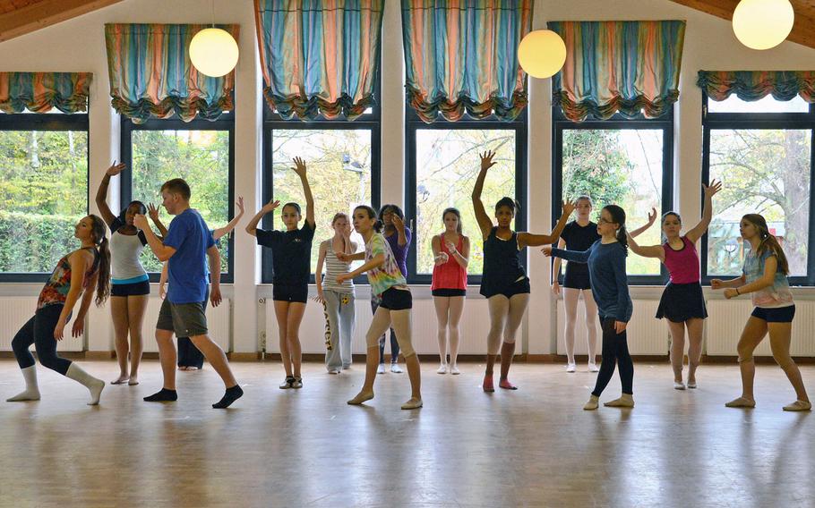 The dance workshop at this year's Creative Connections finishes a piece during a morning session, Wednesday, Nov. 6, 2013. More than 160 students from DODDS-Europe high schools participated in this year's event that features 11 workshops in the visual and performing arts.