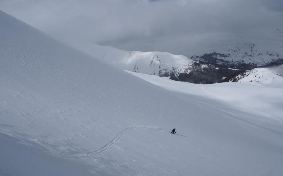 A skier gets fresh tracks while skiing with Eskimo Freeride, a backcountry snowcat operation in the Shar Planina mountains in Macedonia.