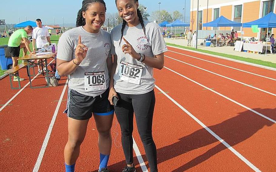 PFC Tisha Prescott (left) and 2nd Lt. Pierjea Lyon, of the only all-female team of 46 in the race - and so already winners in the women's category. The relay race commemorates a battle in Vietnam on Nov. 8, 1965 in which 48 soldiers with the 173rd Airborne Brigade died.