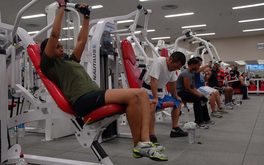 Patrons work out at Gunner's Gym, a Marine Corps facility at Camp Foster on Okinawa on Nov. 5, 2013. The gym sold the supplement Craze until sales were restricted by the service in October after reports that it contained an amphetamine-like substance.