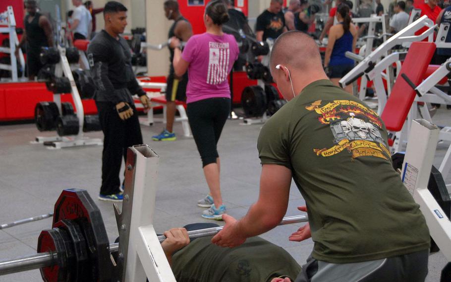 Patrons work out at Gunner's Gym, a Marine Corps facility at Camp Foster on Okinawa on Nov. 5, 2013. The gym sold the supplement Craze until sales were restricted by the service in October after reports that it contained an amphetamine-like substance.