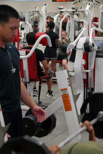 Patrons work out at Gunner's Gym, a Marine Corps facility at Camp Foster on Okinawa on Nov. 5, 2013. The gym sold the supplement Craze until sales were restricted by the service in October after reports that it contained an amphetamine-like substance.