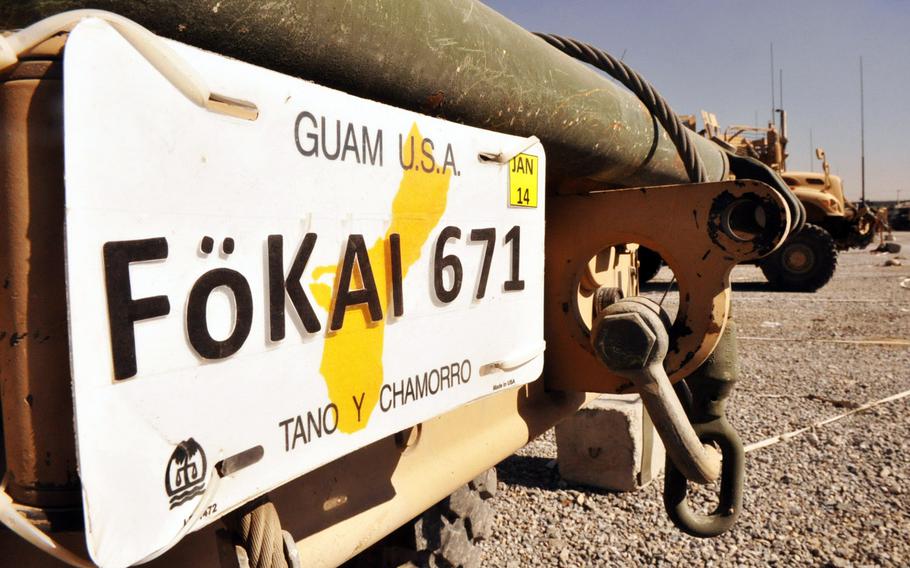 A license plate on the front of an MRAP for Task Force Guam at Camp Phoenix in Kabul. The plate reads, "Tano y Chamorro," which means "the land and the people" in the Chamorro language spoken in Guam. Chamorro is also the word that refers to the indigenous people of Guam and the Mariana Islands where Guam is located.