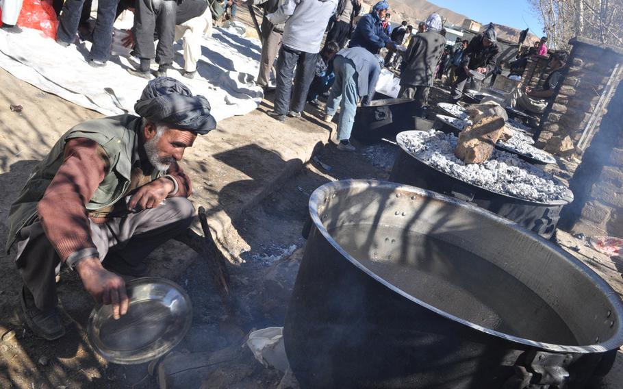 Volunteers prepare food for hundreds of faithful who gathered for Ashura services in Bamiyan, a city high in the mountains of central Afghanistan and a stronghold of the country's Shia Hazara minority. Ashura is a day of mourning for Shia Muslims, commemorating the martyrdom of Hussein Ibn Ali, grandson of the prophet Muhammad.