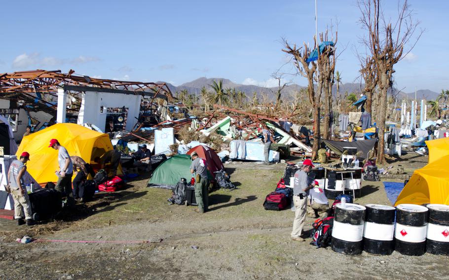 U.S. Venterans with Team Rubicon set up a camp at Tacloban Airport. They are actively assisting in the relief effort in areas of the Philippines hit by Super Typhoon Haiyan. Eric Guzman/Stars and Stripes