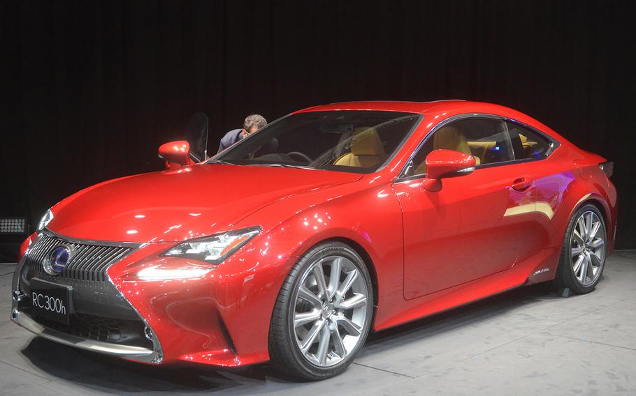 Electric cars and hybrids -- like the Lexus RC 300h, shown here -- are receiving prominent showroom space at several top manufacturers' pavilions during the 2013 Tokyo Motor Show.