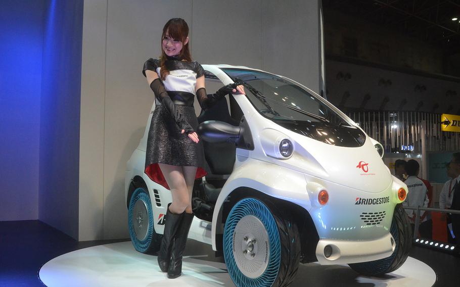 Most of Japan's top automakers showed off one-seater vehicles, including this Toyota model built with custom Bridgestone wheels.