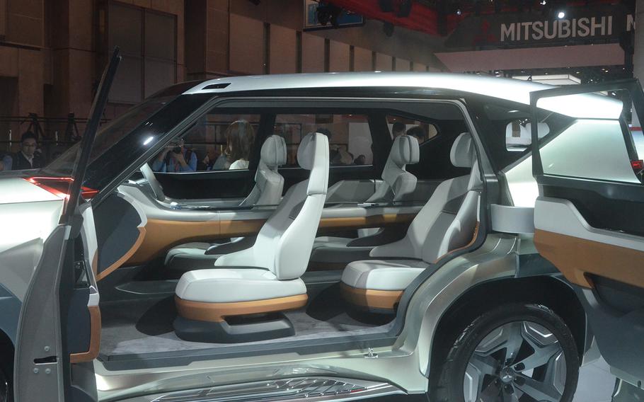 Mistubishi's latest SUV concept includes a center console computer that extends into the back passenger seats.