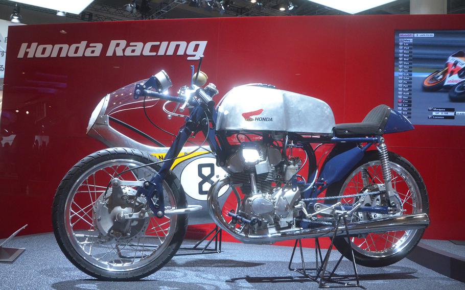Honda's classic 1959 RC-142 motorcycle is on display at the 2013 Tokyo Motor Show.